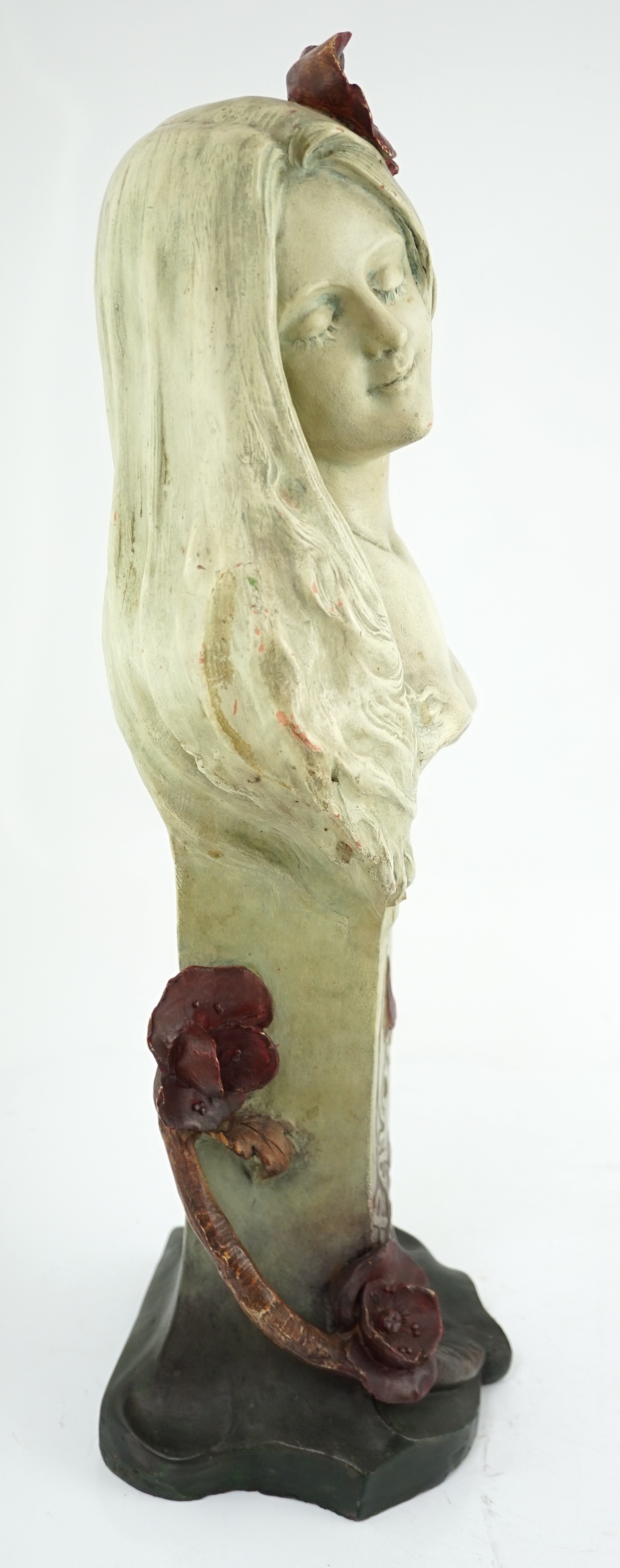 Rene Charles Masse (French, 1855-1913), an Art Nouveau figural terracotta bust 'Pavots', modelled with poppies in her hair and around the plinth, signed, 31cm wide, 63cm high. Condition - fair